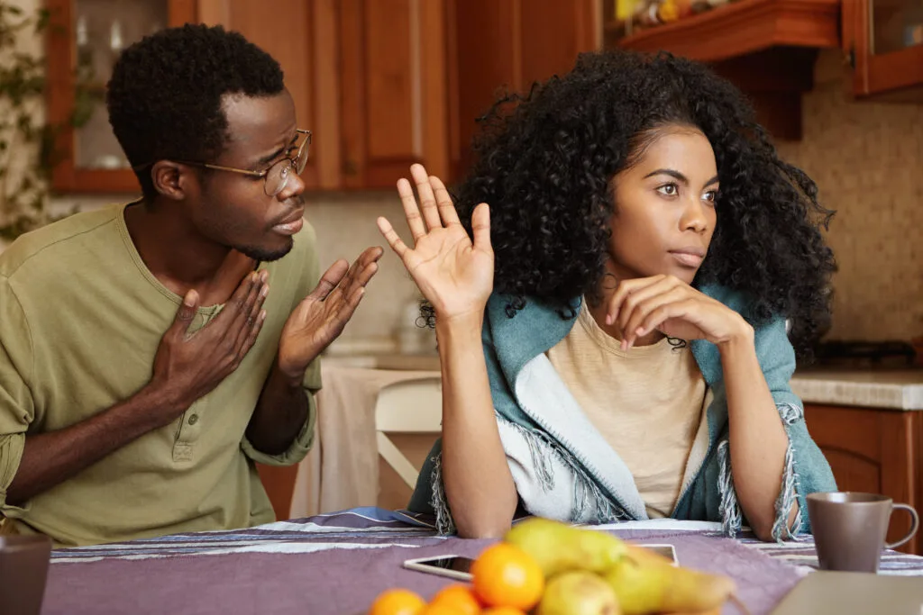Are you single this valentine's day? Maybe you are part of the problem, we can help 2 Couple discussing valentine's day relationship problems